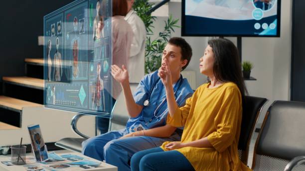 istock Doctor shows patient AR brain scan 1622545219