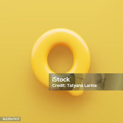 istock 3D Yellow letter Q with a glossy surface on a yellow background . 1622547417