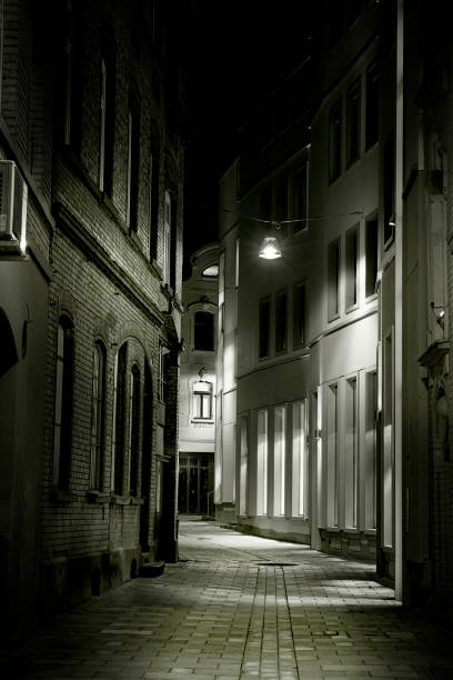 istock Narrow alley at night 162255236