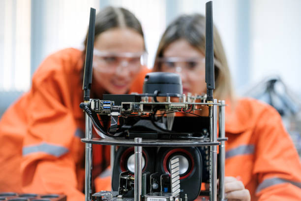 istock Multiracial tachnicial engineer training with robot arm 1622558833