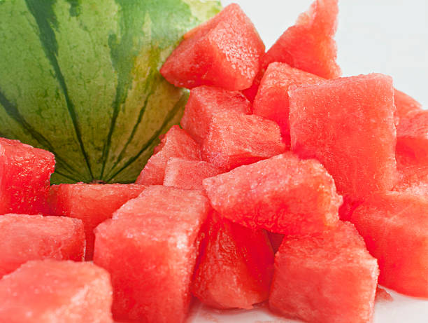 Chunks of fresh ripe watermelon Close up of juicy watermelons chunks. Horizontal. watermelon chunks stock pictures, royalty-free photos & images