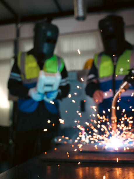 istock Multiracial tachnicial engineer training with robot arm 1622587701