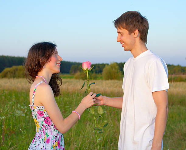 istock Young couple with rose 162258880