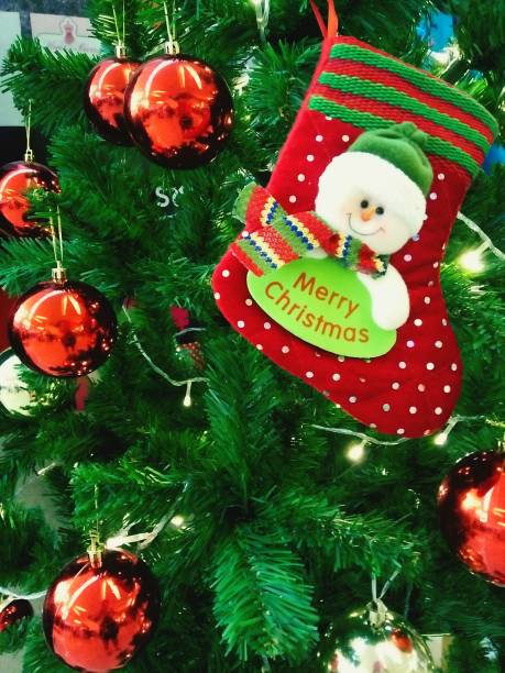 istock Merry Christmas holiday tree background 1622590490