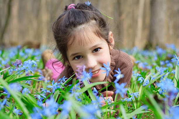 istock Girl among the bluebells 162260495
