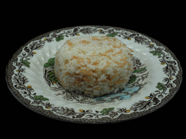istock Rice pilaf and fried meatballs. Black background 1622605402