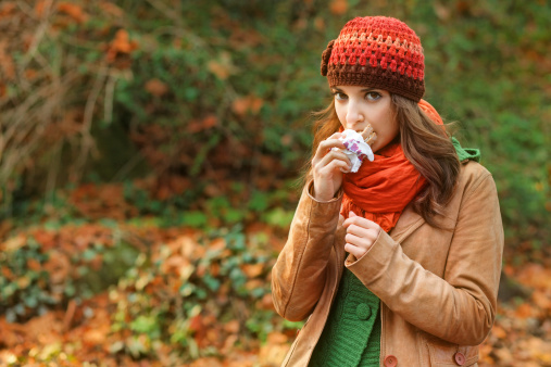 girl eating sandwich in the forest