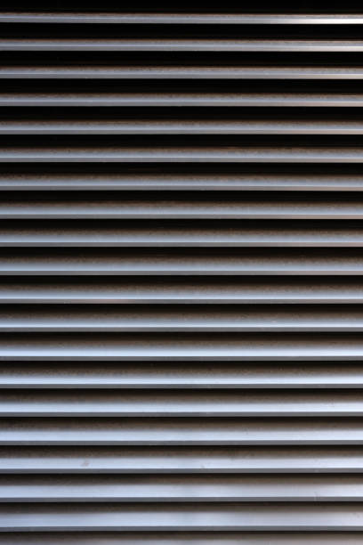 istock Gray metal vented wall detail 1622626041