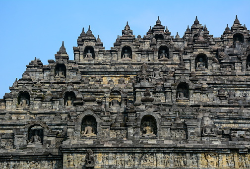 Part of Borobudur Temple on Java, Indonesia. Built in the 9th century, the temple was designed in Javanese Buddhist architecture.
