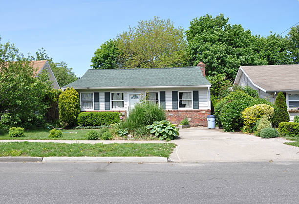 istock Suburban Bungalow Home Landscaped with Plants 162264360