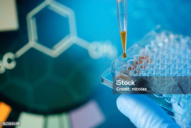 Lab Experiment Stock Photo - Download Image Now - Laboratory, Healthcare And Medicine, Engineer