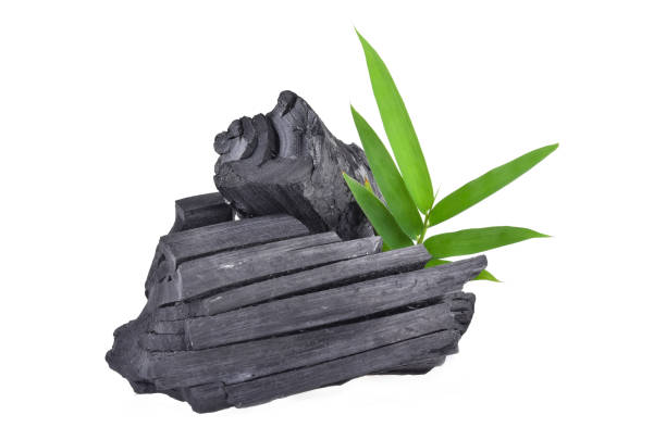 istock Natural wood charcoal isolated on white background 1622660308
