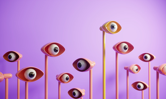 Abstract digital generated eyes looking around and the yellow one standing out from the crowd. (3d render)