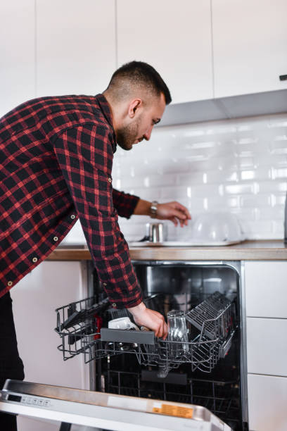 istock Dishwasher Used In Kitchen By Male 1622686976