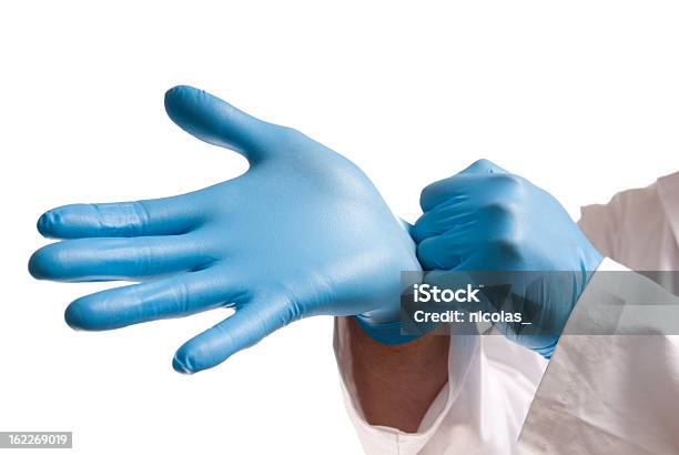 Odzież Ochronna - zdjęcia stockowe i więcej obrazów Rękawica chirurgiczna - Rękawica chirurgiczna, Niebieski, Rękawica ochronna