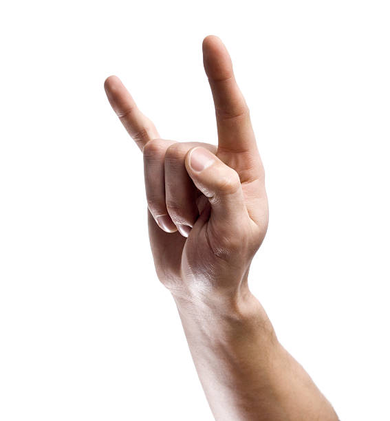 Rock On A hand making a rock & roll gesture horn sign stock pictures, royalty-free photos & images