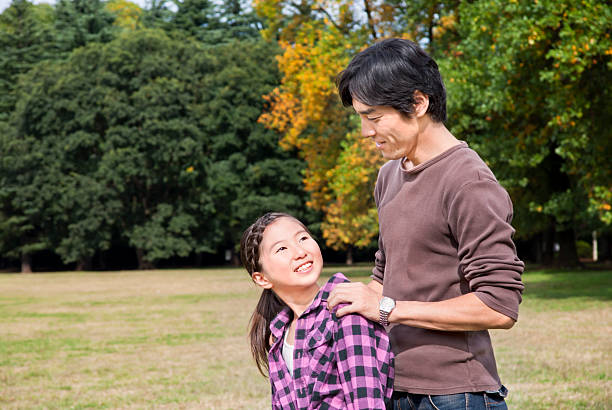 istock Asian father and daughter at a park 162272949