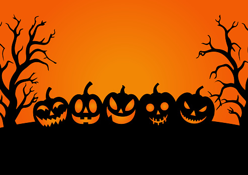 Spooky halloween background with pumpkins