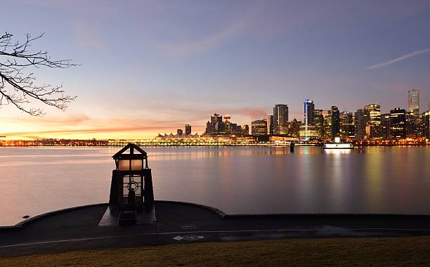 istock Nine O'clock Gun and Vancouver cityscape at sunrise 162276106