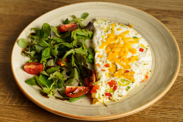 istock Egg white omelet with cheddar cheese, zucchini, red pepper and leek 1622774722