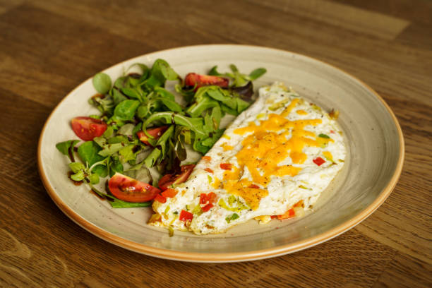 istock Egg white omelet with cheddar cheese, zucchini, red pepper and leek 1622776830