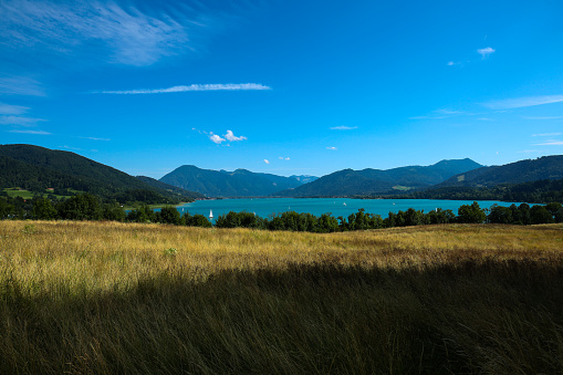 Tegernsee from the mountain, with a blue sky