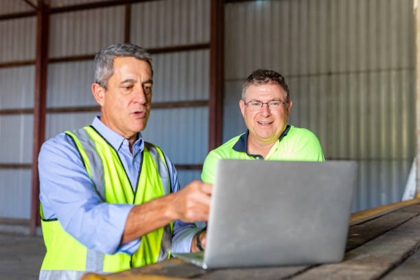 istock Maori Engineer With a Computer in a Warehouse Meeting 1622783998
