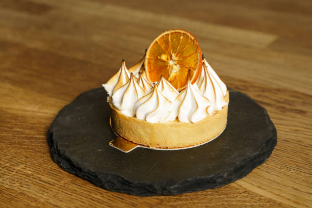 istock Orange cake with cream on top 1622786647