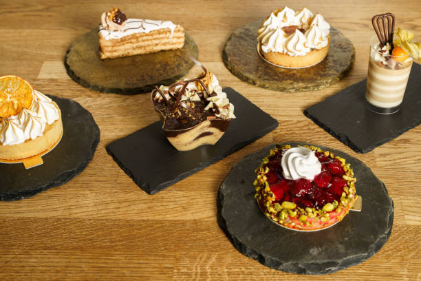 istock Different sweet desserts on a wooden table 1622788232