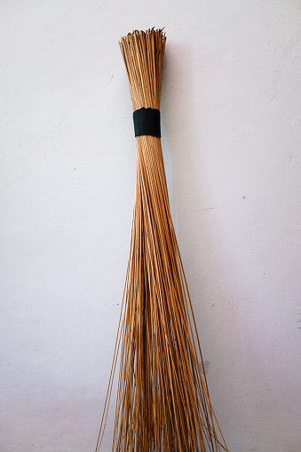 a broom stick made from coconut tree leaves, usually used to sweep in the yard