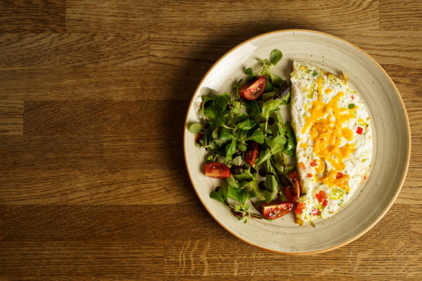 istock Egg white omelet with cheddar cheese, zucchini, red pepper and leek 1622809853