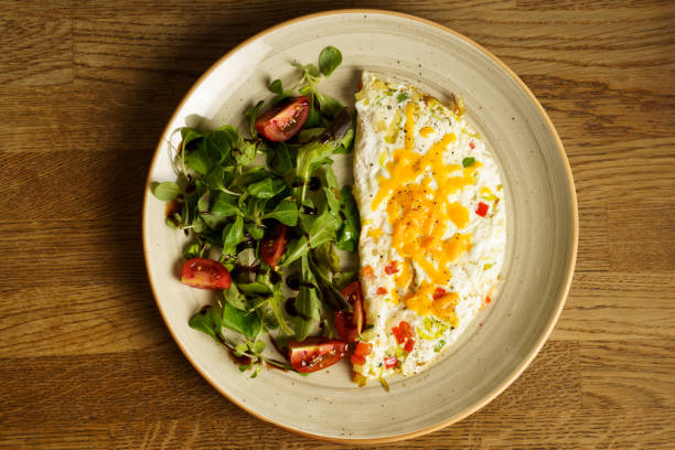 Egg white omelet with cheddar cheese, zucchini, red pepper and leek