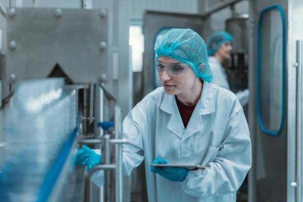 istock Supervisors check automated bottling for sequence accuracy, safety, reliability at water pipeline. 1622822188