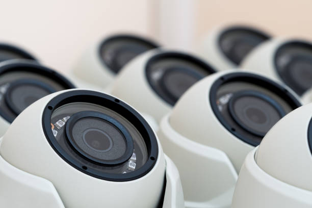istock Security cctv cameras on the table close up. Video surveillance background 1622835011