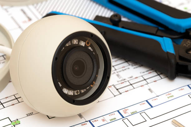 istock Video security equipment and blueprint on a table. Soft focus photo Good for security service engineering company site or advertising. 1622836079