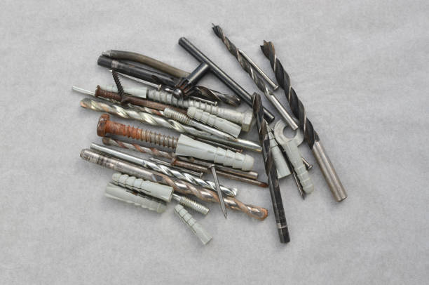 istock Close-up of drill bits with screws ready for work, representing efficiency in construction. Set of close-up drills, perfect for representing precise work in the field of construction. 1622839855