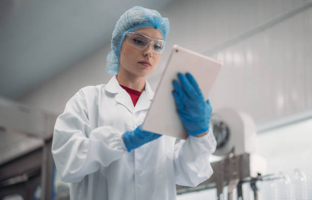 istock Supervisors check automated bottling for sequence accuracy, safety, reliability at water pipeline. 1622883716