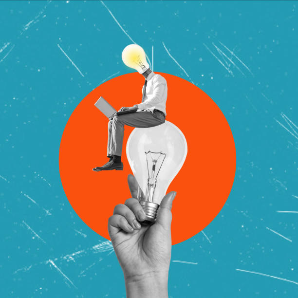 istock A developer with a laptop sits on an electric lamp. New idea. Business concept. 1622897485