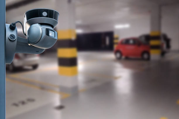 istock CCTV camera in underground parking garage. Copy space. 1622918859