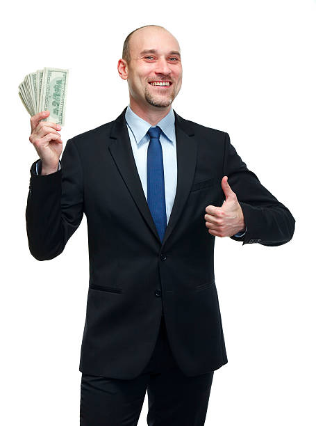 istock Businessman holding dollar bills 162293474