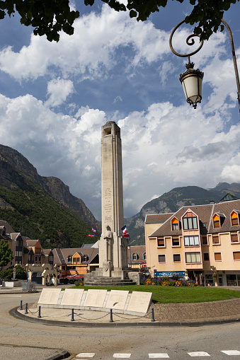 Saint-Jean-De-Maurienne, France, 24 July 2023: View of the town centre and war memorial of Saint-Jean-de-Maurienne in Savoie. It is a main town in the Maurienne Valley, and tourist a destination.