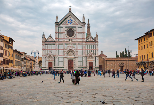 Florence, italy - March 13, 2015:  Basilica di Santa Croce on the Piazza di Santa Croce, basilica is the burial place of Galileo Galilei and other illustrious Italians