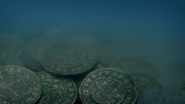 Gold Coins From Shipwreck On Sea Floor