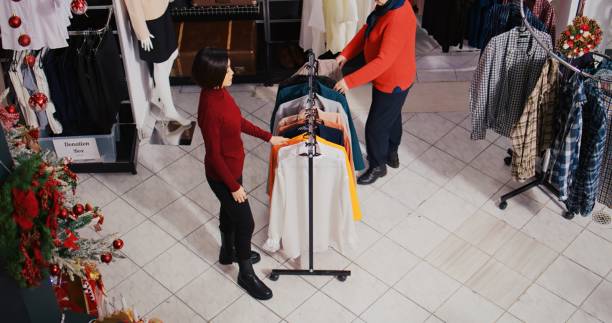 Free Stock Photo of Overhead View of Clothing Store With Clothes on ...