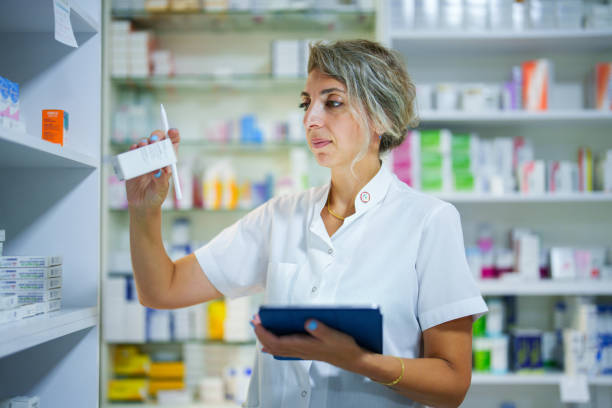 istock Pharmacist checking the pharmacy medication stocks 1623021232