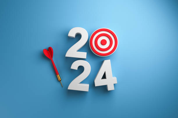 istock 3D volumetric 2024 with target and dart on blue background top view. 1623050543