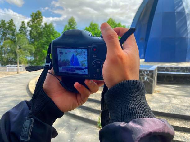 istock the process of taking pictures from a photographer using a digital camera 1623055915