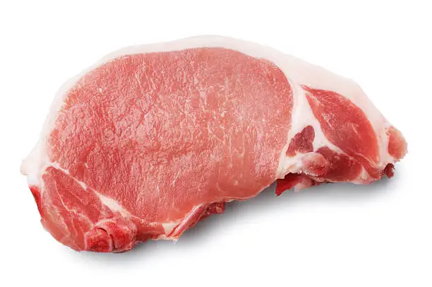 Single pork chop isolated on white.