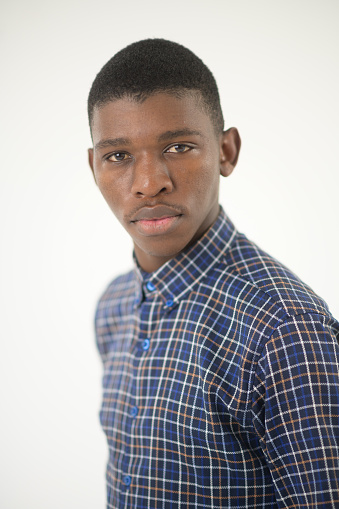 Serious Young African male studio portrait
