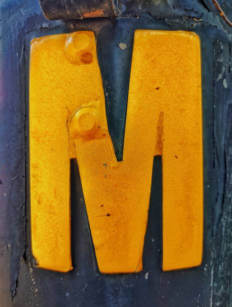 istock A close-up of an alphabet painted on a pole. 1623074605